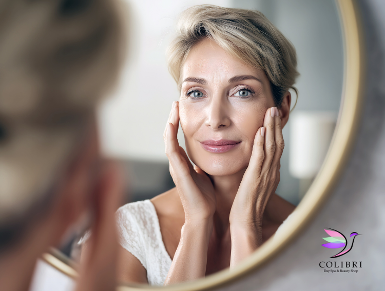 woman with beautiful skin looking in mirror