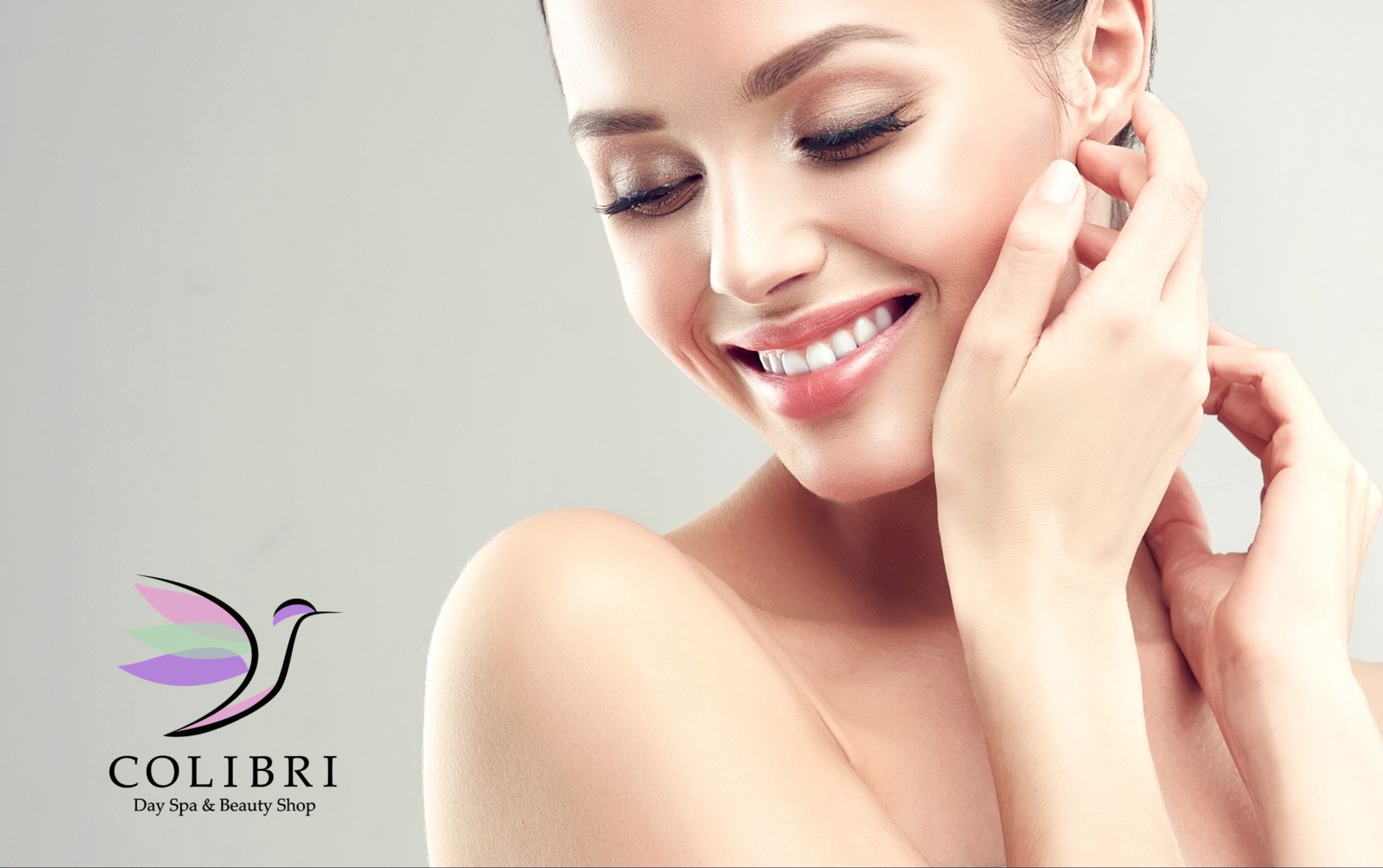 beautiful woman smiling after receiving a luxurious and the best facial in sarasota